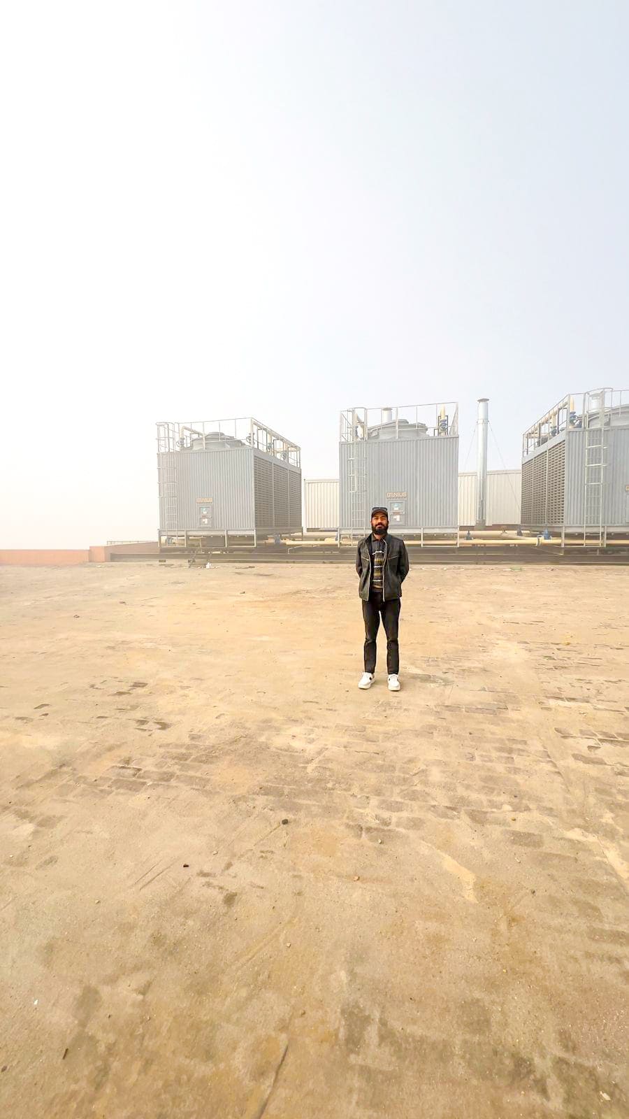 Professional HVAC engineers performing ventilation system testing